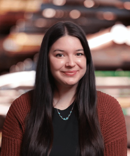 A Woman Smiling For The Camera