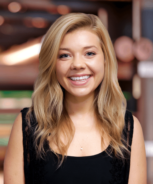 A Woman Smiling For The Camera