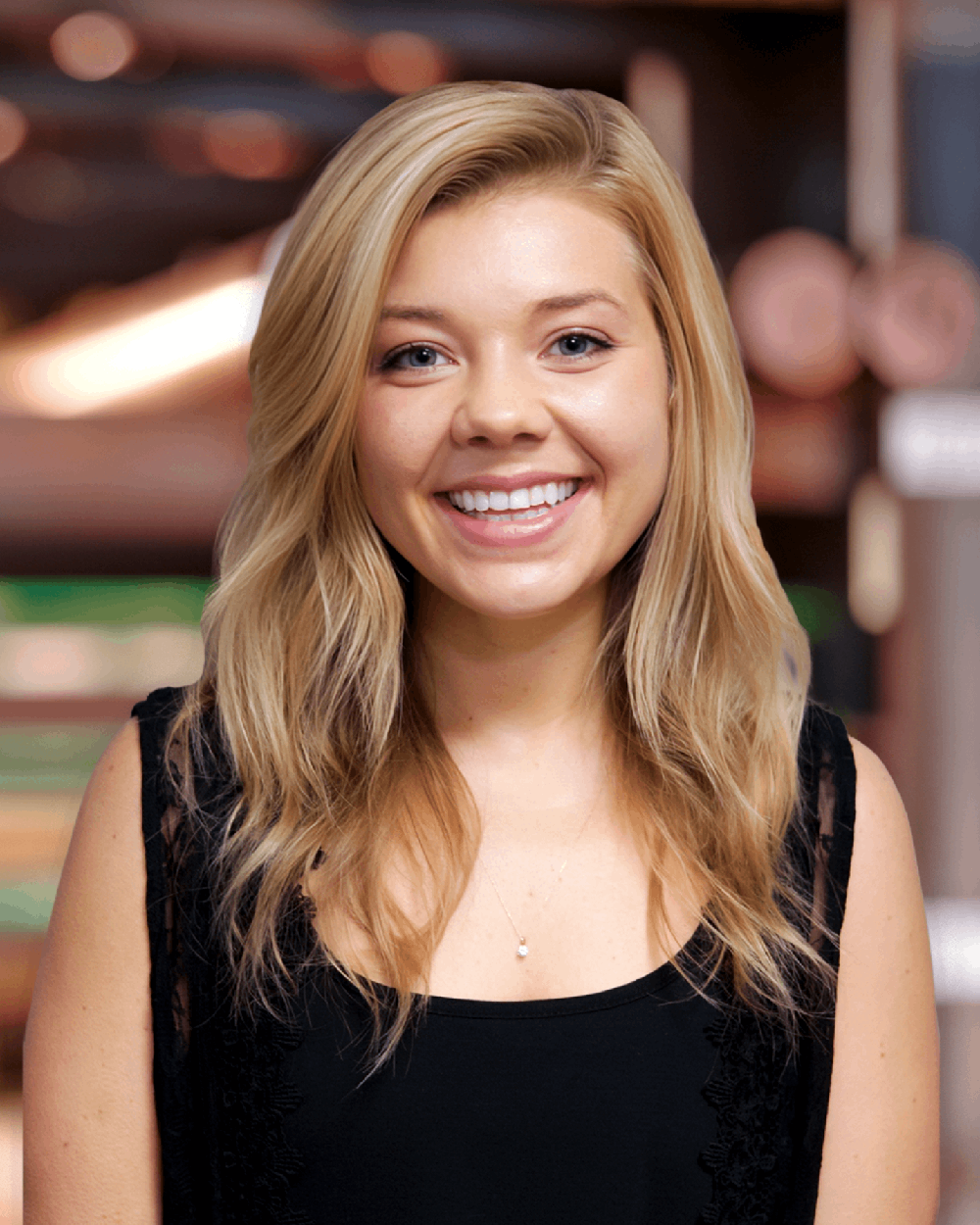 a woman smiling for the camera